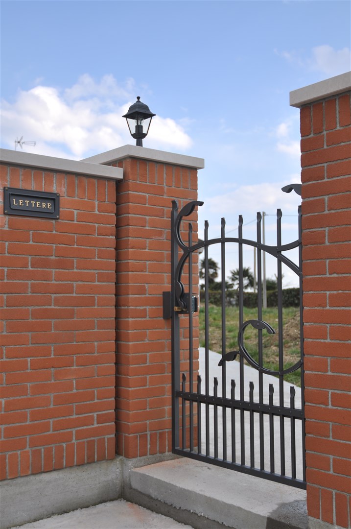 B27-Cancello carraio in ferro battuto