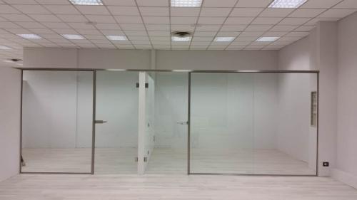 I09-Vetrate in vetro con profili inox