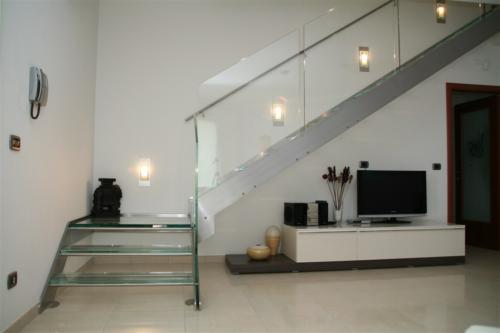 M10-Scala inox con gradini in vetro